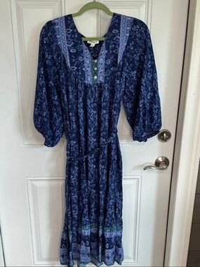 Dress by Beach. Lunch and lounge size L never worn beautiful print and style